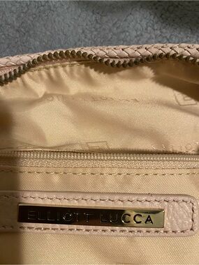 Elliott Lucca cream shoulder bag with gold nameplate